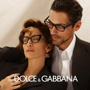 Black acetate-framed cat-eye glasses with gold-tone dolce & gabbana logo detailing.