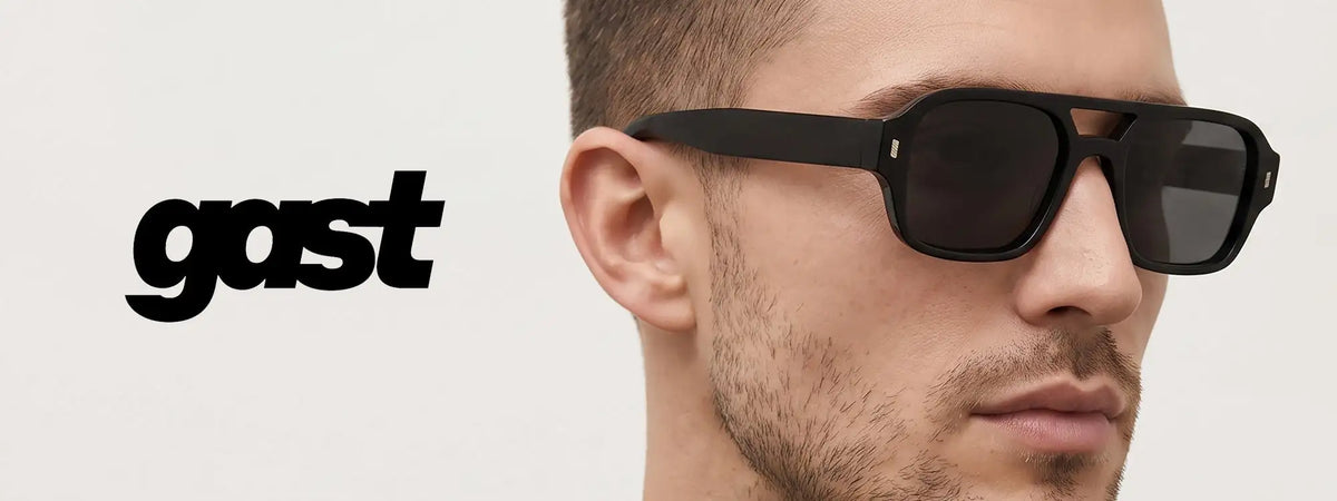 Black rectangular-frame sunglasses with dark lenses and subtle metallic accents on the temples.slider_item_Exzr6D