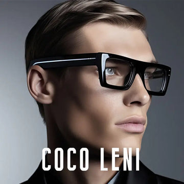 Black rectangular-framed glasses with a sleek, modern design and subtle white accent stripe along the top edge of the frame.