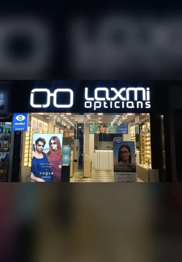 Laxmi Opticians Shela store front at Aaryan Aavishkaar, Sky City Road, Ahmedabad