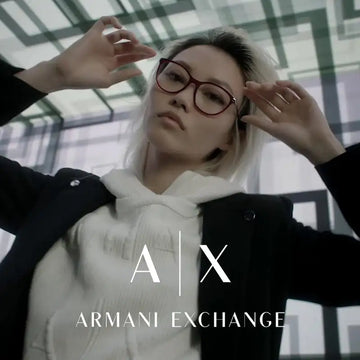 Red-framed rectangular eyeglasses with a sleek, modern design.
