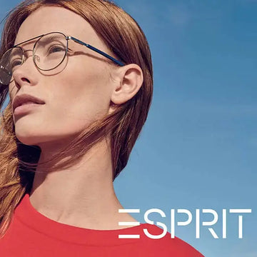 Round-framed glasses with a thin metallic rim and dark blue temple arms, featuring clear lenses.
