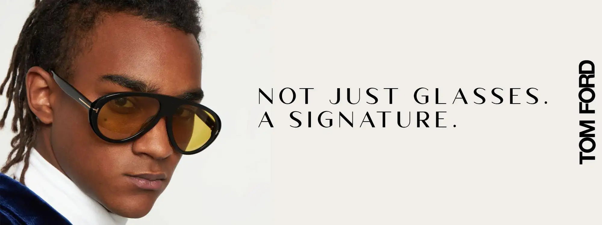 Black-framed tom ford aviator sunglasses with amber-tinted lenses.slider_item_Exzr6D