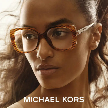 Tortoiseshell-patterned rectangular-framed eyeglasses with a sleek metallic temple and the michael kors logo on the side.