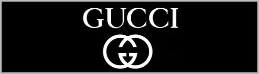 White gucci logo on a black background.